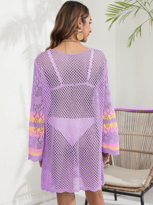 Purple crochet cover-up with striped sleeves and open knit detail.