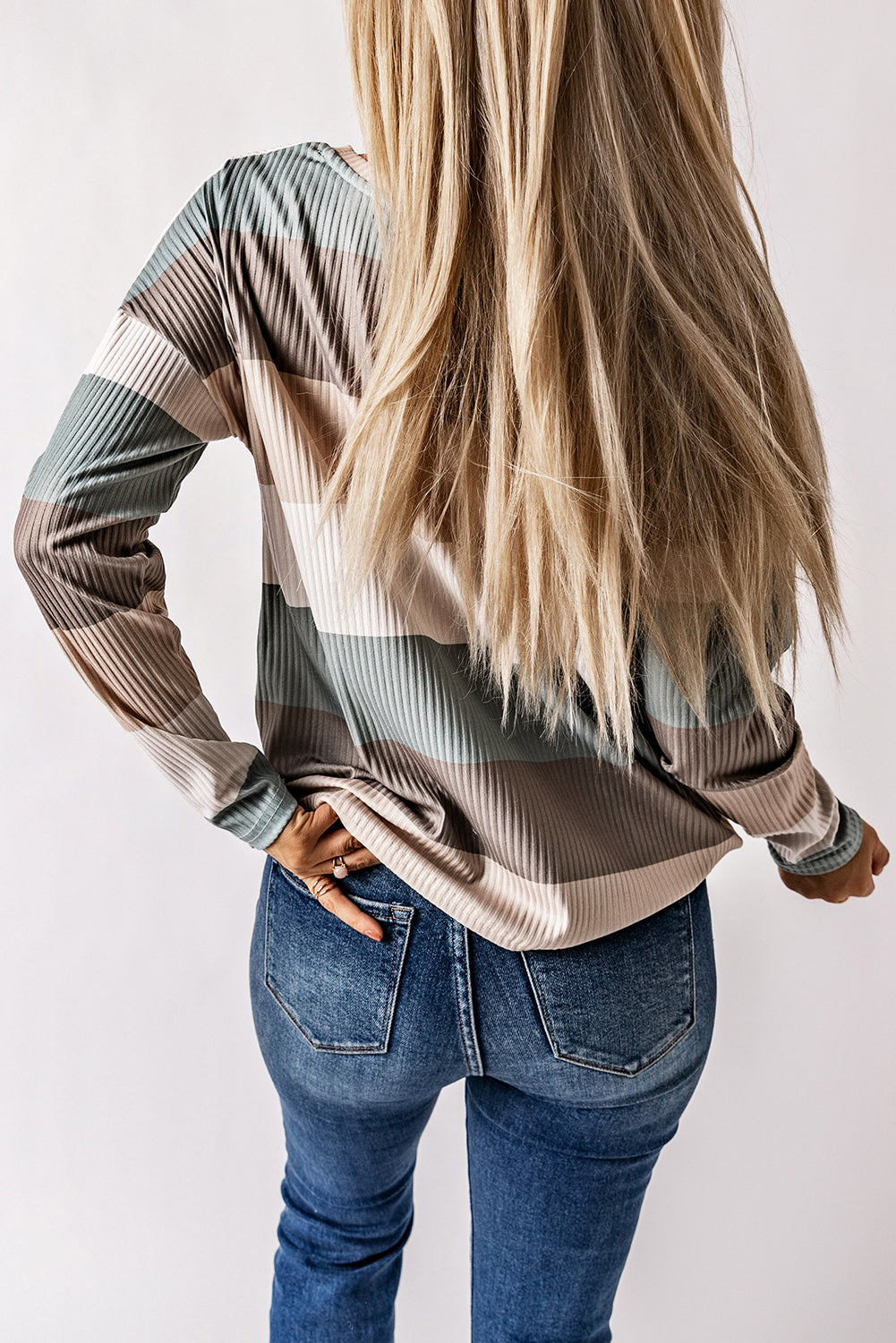 Ribbed stripe long sleeve top in neutral tones with patch pocket detail.