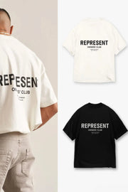 Oversized graphic tee in ivory and black with bold "REPRESENT OWNERS' CLUB" text.
