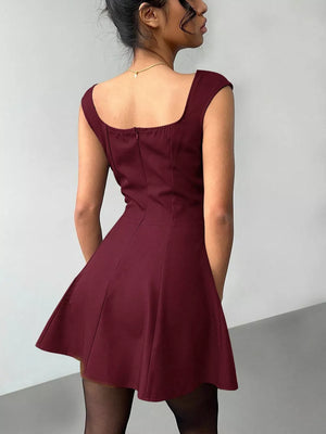 Burgundy sweetheart neckline mini dress with cap sleeves and flared skirt.