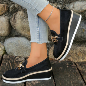 Black chain decor wedge loafers with comfortable platform sole.