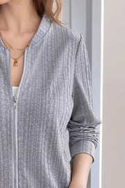 Gray textured ribbed bomber jacket with a zip front and crew neck.