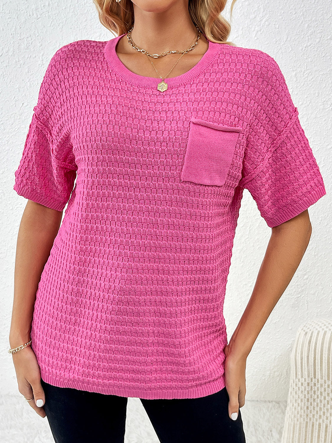 Hot Pink textured knit t-shirt with short sleeves and a chest pocket, featuring a boxy silhouette.
