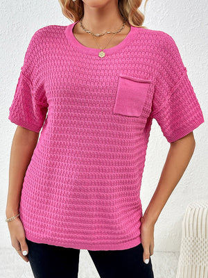 Hot Pink textured knit t-shirt with short sleeves and a chest pocket, featuring a boxy silhouette.