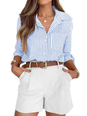 Light blue striped button-down shirt with chest pocket, cuffed sleeves.