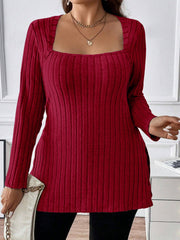Burgundy ribbed knit tunic with square neckline and long sleeves.