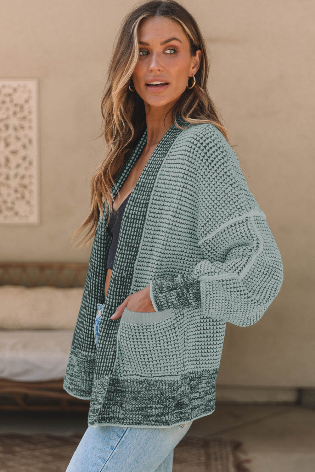 Textured open-front knit cardigan in gum leaf with pockets and a relaxed fit.