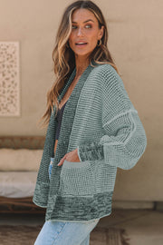 Textured open-front knit cardigan in gum leaf with pockets and a relaxed fit.