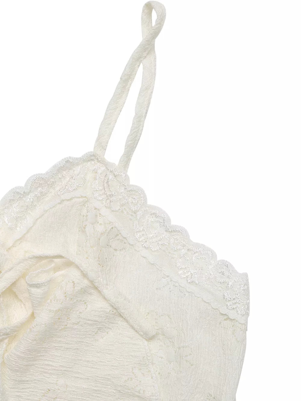 White lace camisole with ruffled hem and tie-front detail.