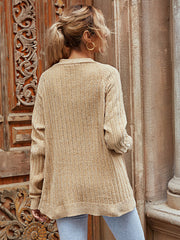 Textured tan cardigan with a collared neckline and long sleeves.