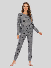 Heather Gray knit loungewear set with black stars, long sleeve top and pants.