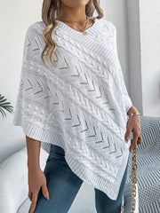 White cable knit poncho with chevron detail and open knit accents
