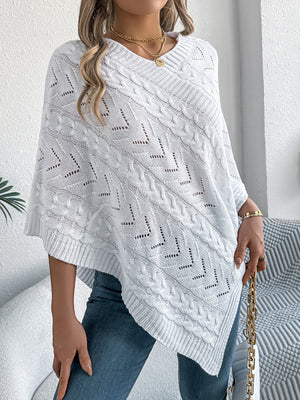 White cable knit poncho with chevron detail and open knit accents
