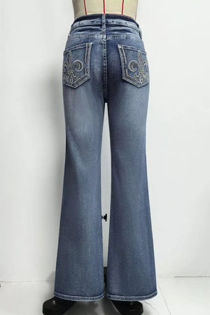 Classic high-waisted flare jeans in blue denim with embroidered back pockets.