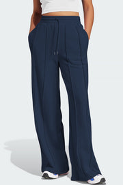 Dark Navy seamed wide leg lounge trousers with drawstring waist and pockets.