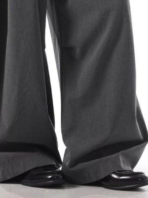 Men's charcoal wide leg sweatpants with a relaxed fit, paired with black dress shoes.