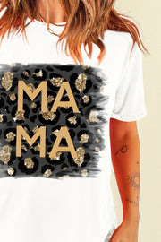White graphic tee with leopard print and gold glitter accents spelling out MAMA.