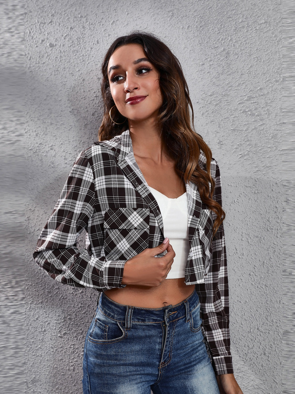 Cropped plaid shirt jacket in mocha with buttoned front and chest pockets.