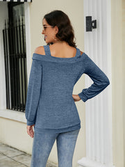Cutout shoulder square neck blouse in Pastel Blue with long sleeves.