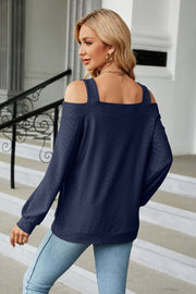 Dark Blue textured open shoulder blouse with square neckline and long sleeves.