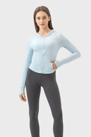 Light blue active hoodie with thumbholes and zipper closure