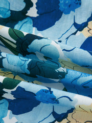 Cotton blouse with vibrant blue floral print and puff sleeve detail