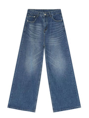 Light blue denim palazzo trousers with a wide leg and buttoned fly.