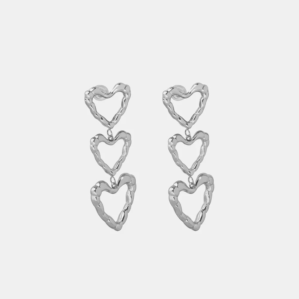 Silver triple heart drop earrings with textured finish