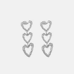 Silver triple heart drop earrings with textured finish