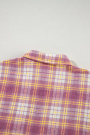 Oversized pink plaid button-down flannel shirt with a classic collar.