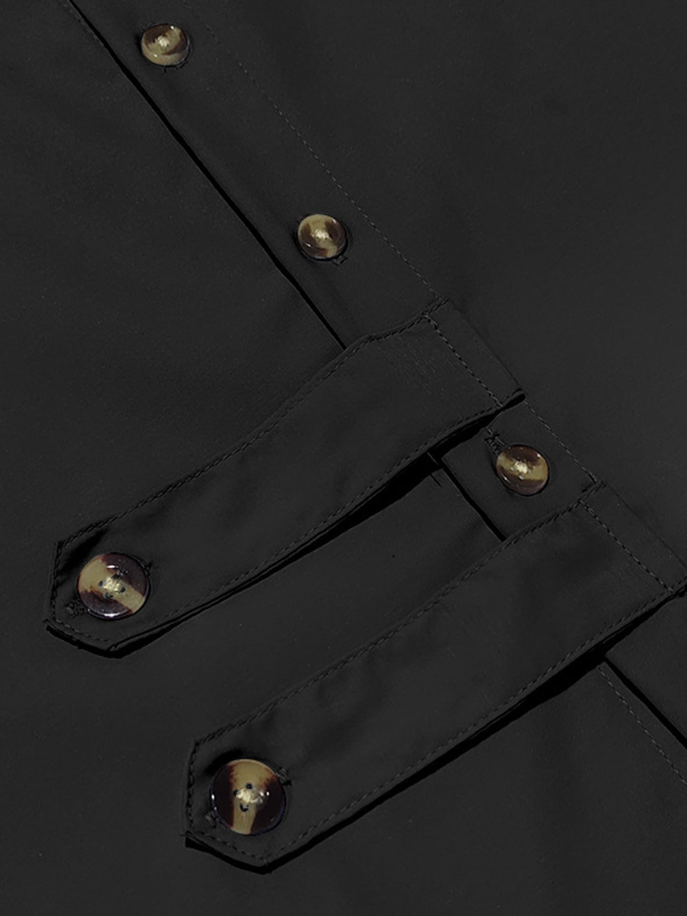Black long-sleeve men's cotton button-down shirt with decorative buttoned tabs.
