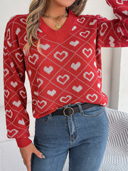 Deep Red V-neck knit sweater with allover white heart jacquard pattern and argyle details.