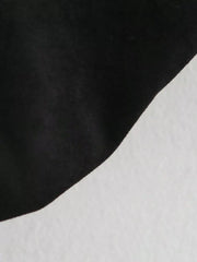 Black oversized zip-up jacket with a soft texture.