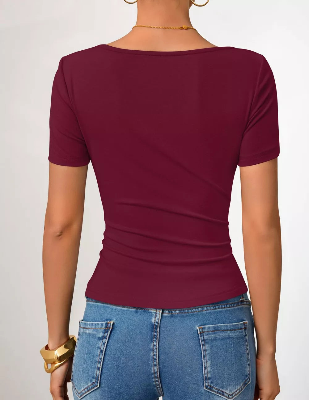 Burgundy maternity t-shirt with short sleeves and a fitted silhouette, showing the back detail.
