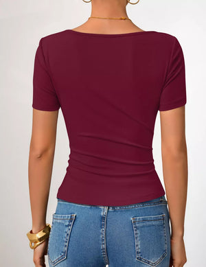 Burgundy maternity t-shirt with short sleeves and a fitted silhouette, showing the back detail.