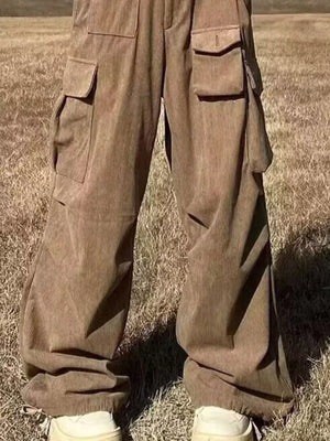 Brown ribbed cotton cargo joggers with spacious pockets.