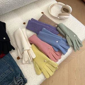 Convertible ribbed knit touchscreen gloves in multiple colors with button detail.