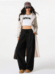 Black corduroy maternity trousers with wide legs and drawstring waist