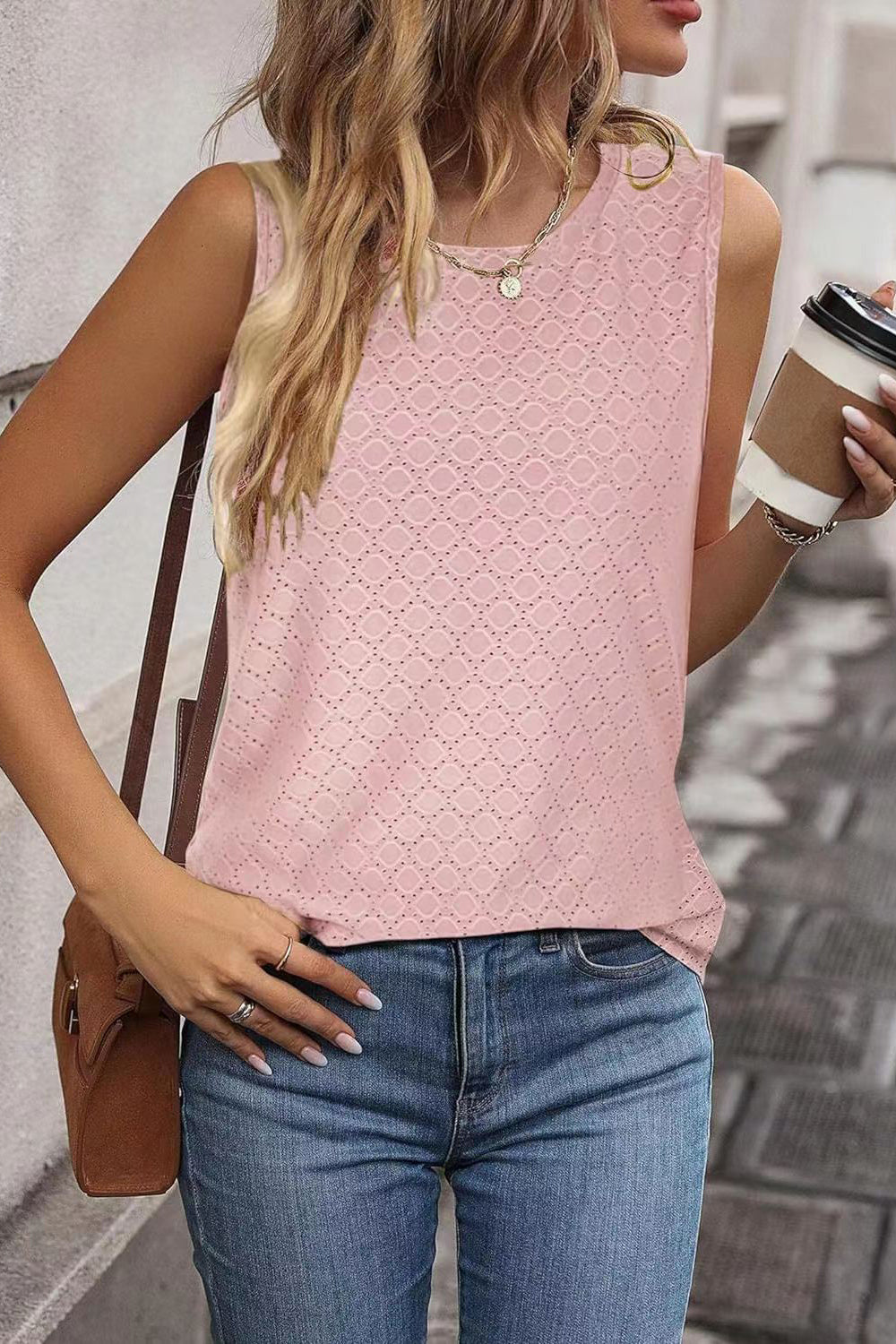 Textured sleeveless shell top in dusty pink with a diamond pattern.