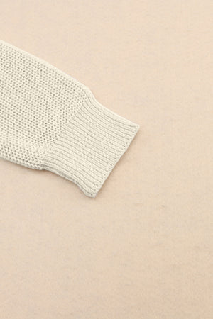 Relaxed knit v-neck pullover sweater in beige with ribbed cuff detail