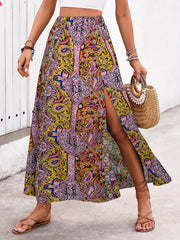 Paisley print maxi skirt with a high slit in yellow-green and purple bohemian style