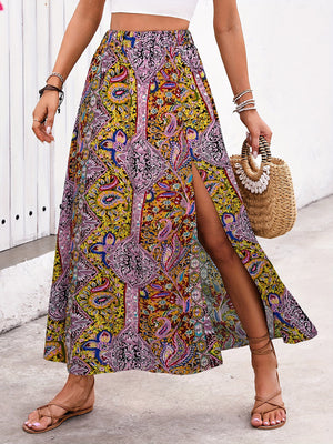 Paisley print maxi skirt with a high slit in yellow-green and purple bohemian style