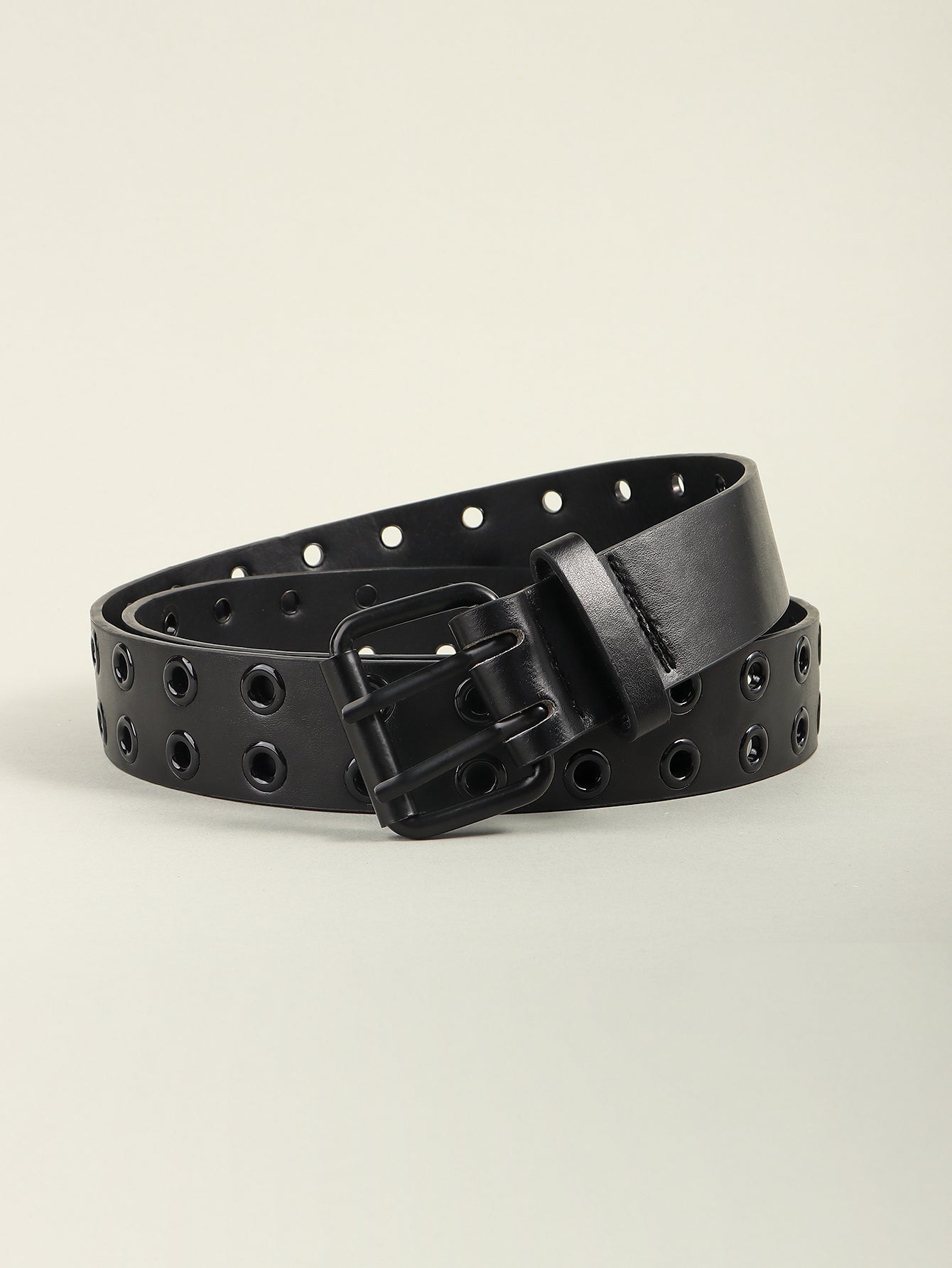 Black vegan leather belt with double grommets and a matte black buckle.