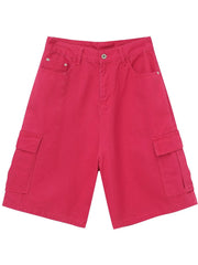 Magenta baggy cargo bermuda shorts with buttoned flap pockets.