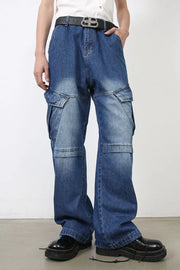 Cargo denim flare trousers in medium wash blue with multiple pockets and a relaxed fit.