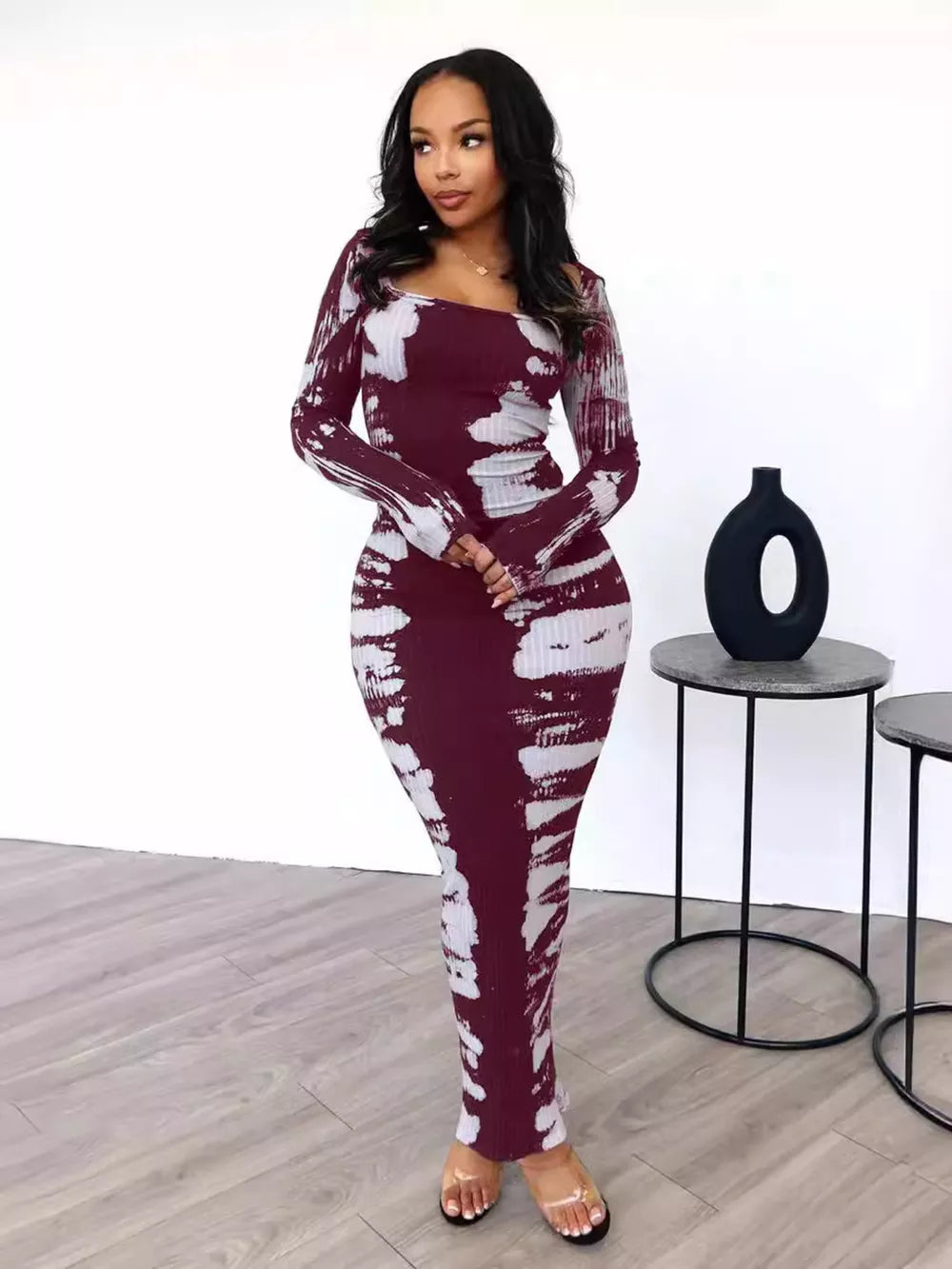 Wine red tie-dye maxi dress with long sleeves and square neckline.