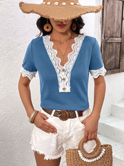 Cerulean waffle knit henley with lace trim and button detail.