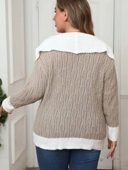 Khaki cable knit sweater with a white contrast collar and cuffs.