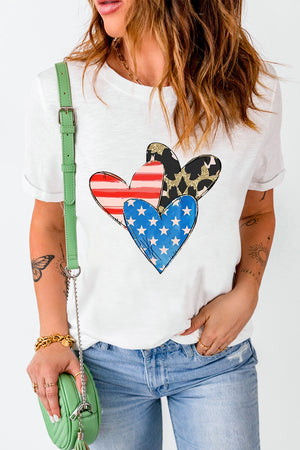 White t-shirt with Americana heart graphic featuring stars, stripes, and leopard print patterns.