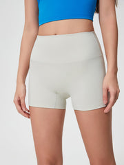 Nova Rise High-Motion Shorts in light gray, with a seamless high waist and short inseam.